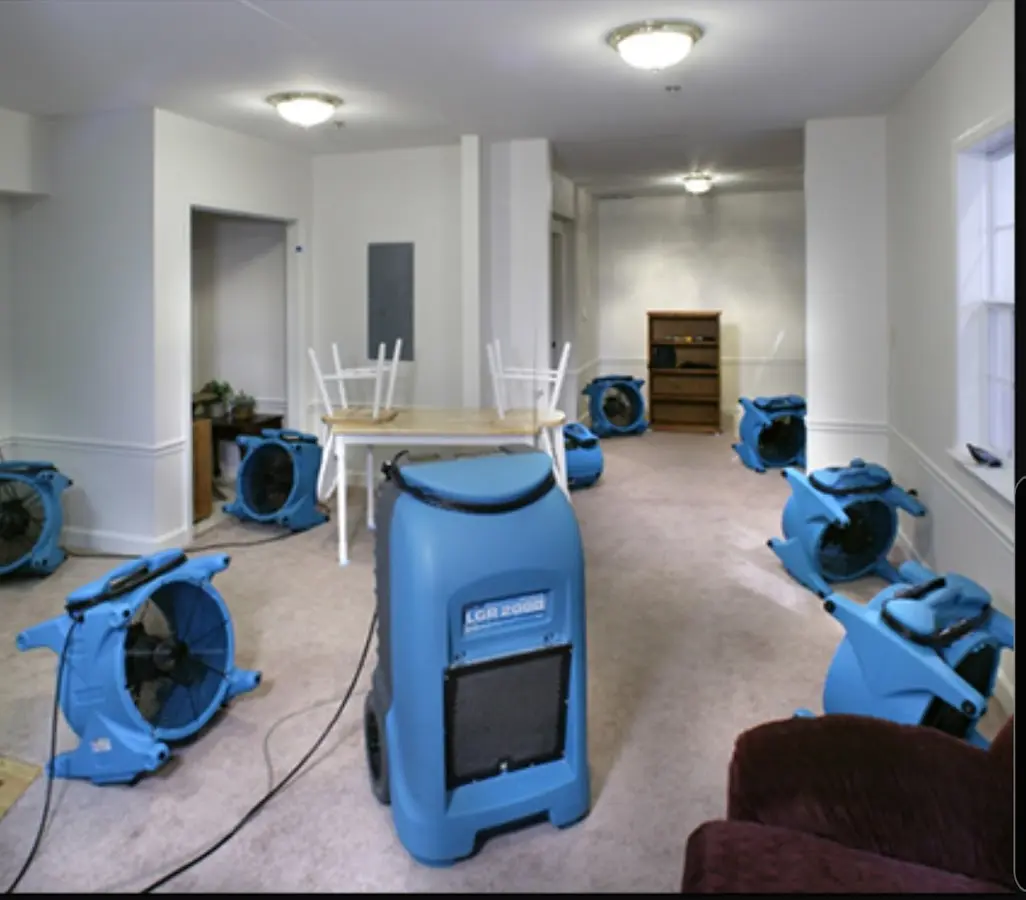 Air movers and dehumidifier setup for Water Damage Restoration in Fairland